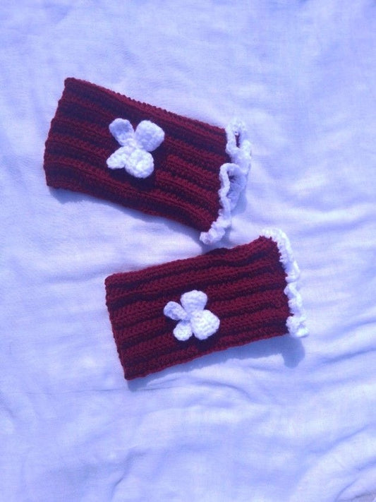 Red hand warmers with white bow