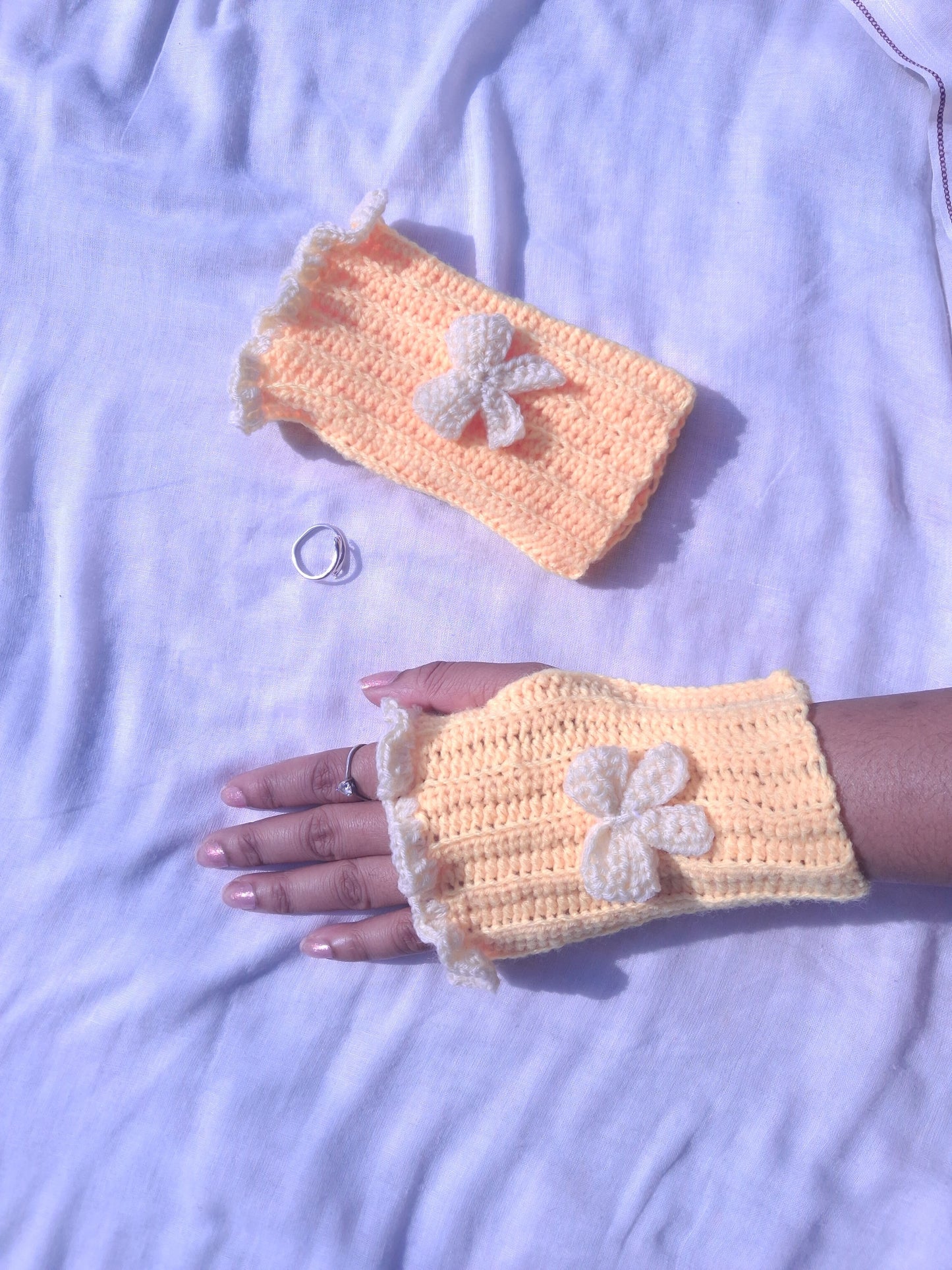 Butter yellow hand warmers with white bow