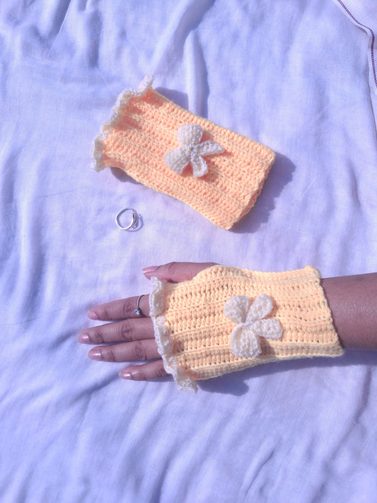 Butter yellow hand warmers with white bow